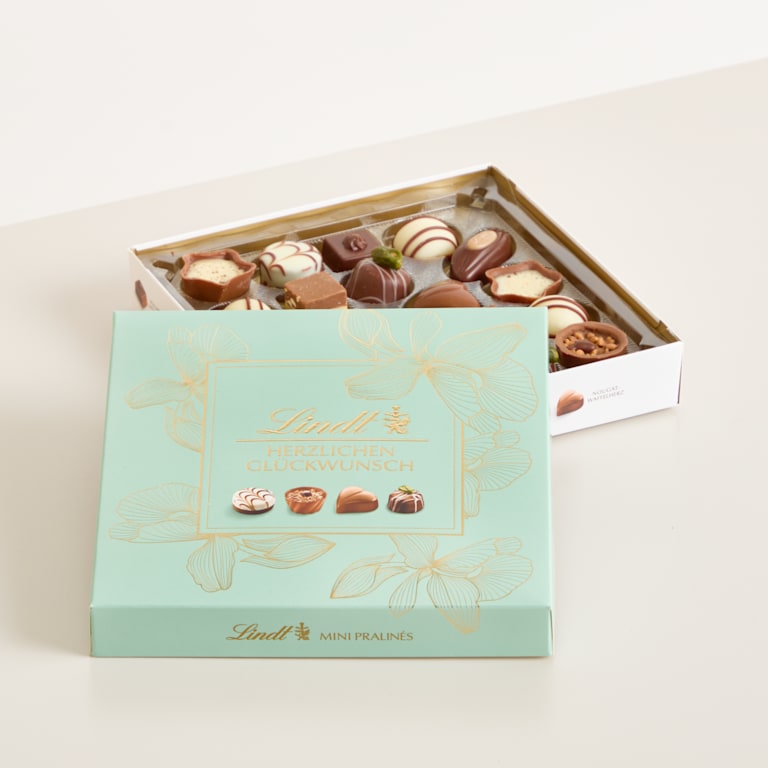 blume2000 Blühpflanze im Topf Sweet Sunshine mit Lindt Pralinés Glückwunsch 100g Versandkostenfrei